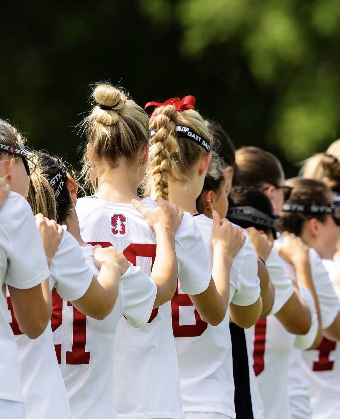 Stanford women's lacrosse players standing together before a game