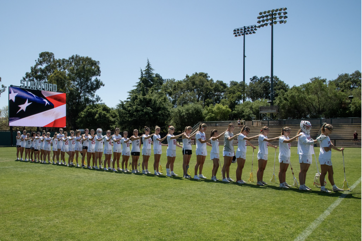 Stanford women's lacrosse team lined up on the field before a game